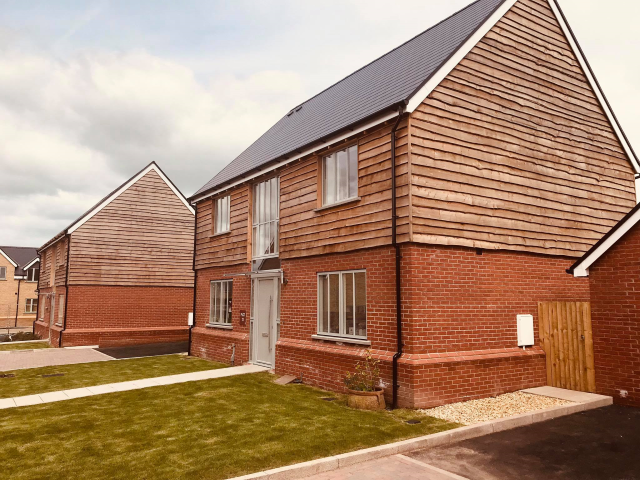 CO2 Timber Waney Edge Cladding on a House Cladding 111 British Timber Cladding 111